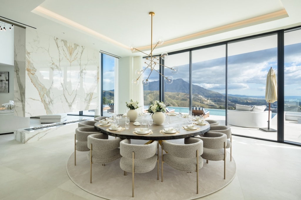 Interior of El Unico villa featuring a spacious, modern living area with sleek furniture and high-end finishes.